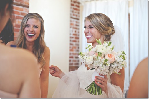 Bride and Bridesmaid Laughing