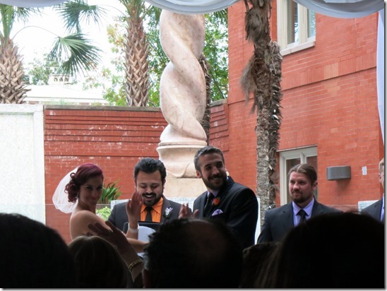 bride and groom wave