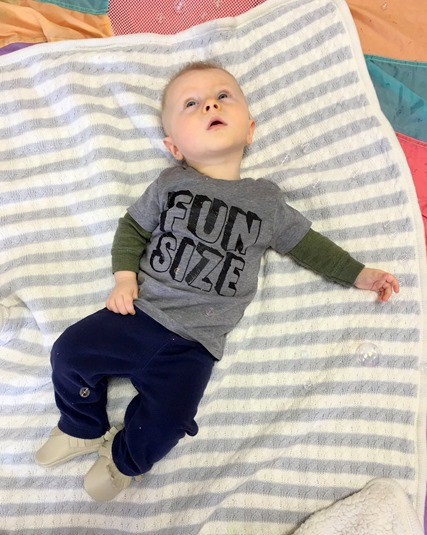 baby looking at bubbles