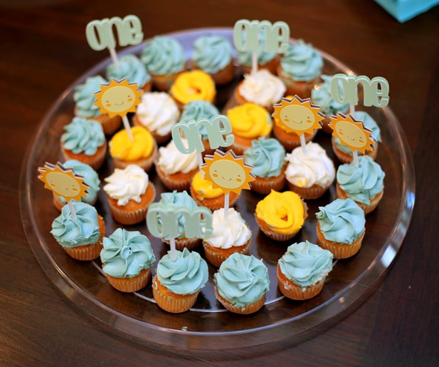 Whole Foods Cupcakes with Sunshine Cupcake Toppers for You Are My Sunshine Birthday Party