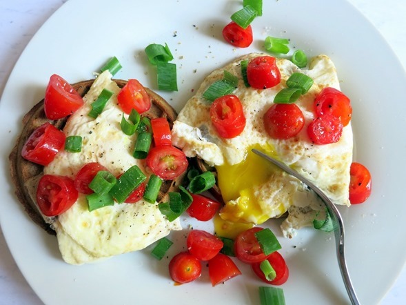 runny eggs on waffles