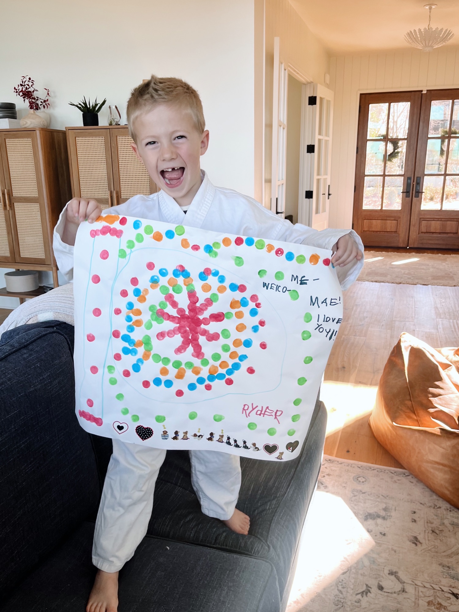 little boy showing his art little boy showing his art