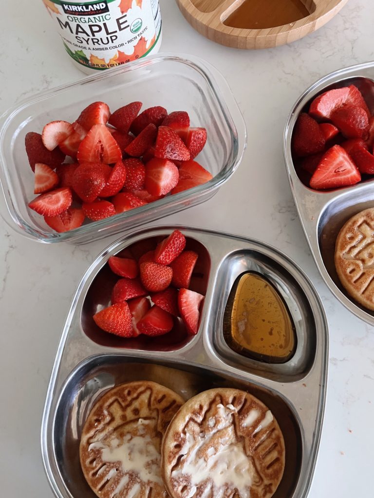 Buttered Simple Mills Waffles with Maple Syrup and Strawberries