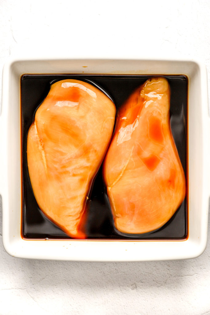 Marinate chicken breasts in teriyaki sauce