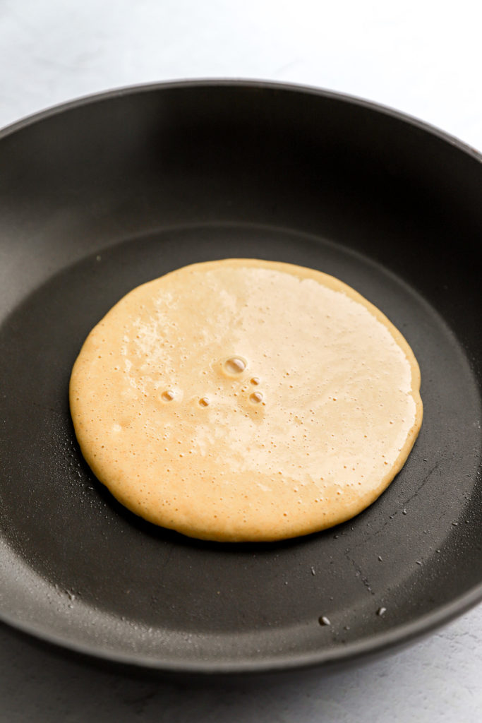 Pour batter onto pan